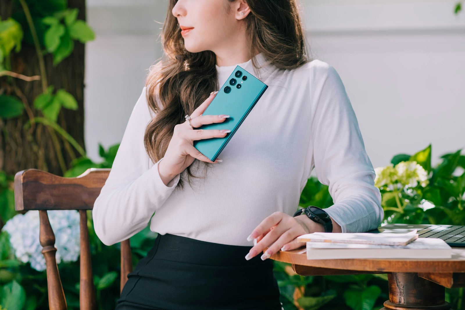 a woman looking at a tablet