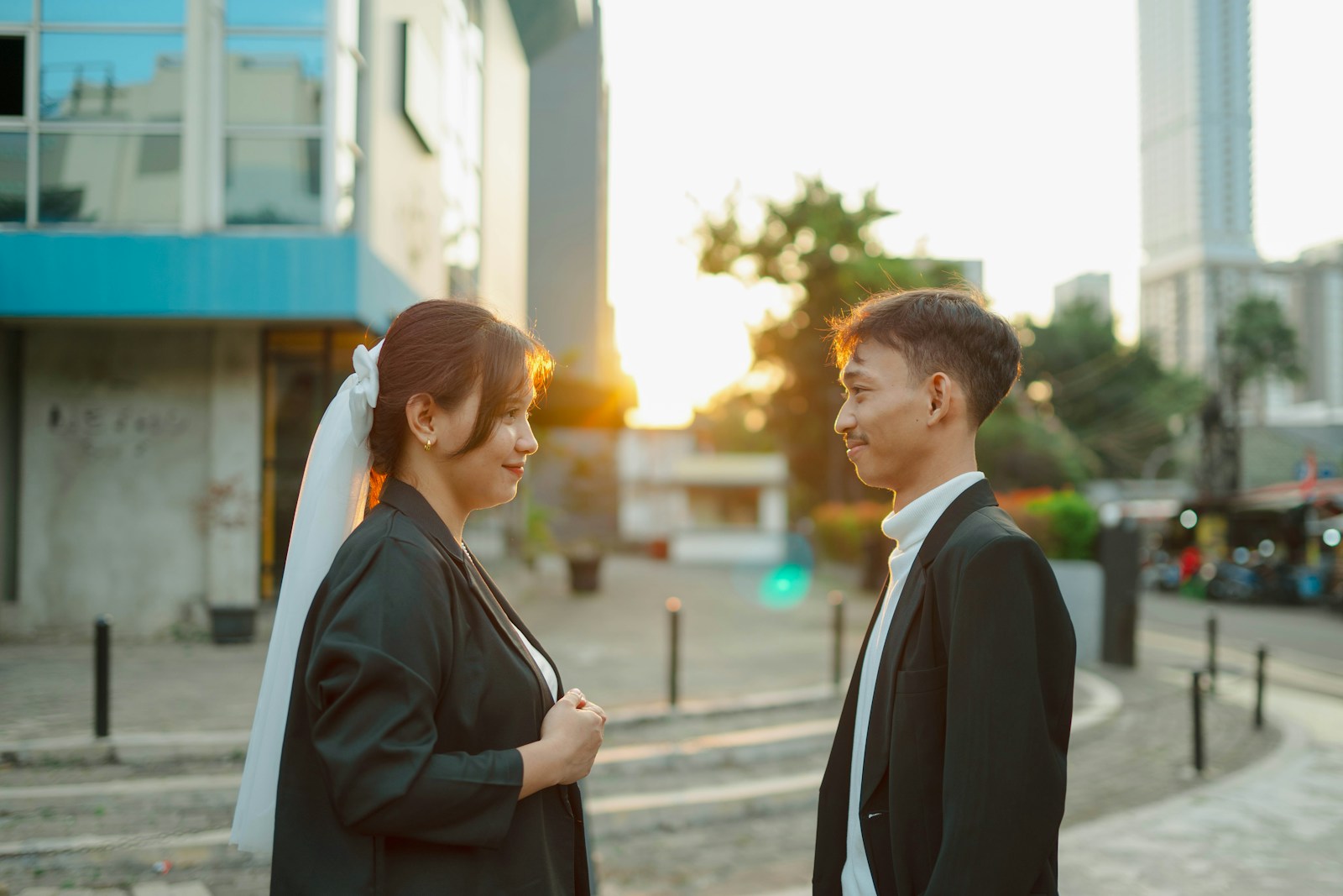 A man and a woman standing next to each other