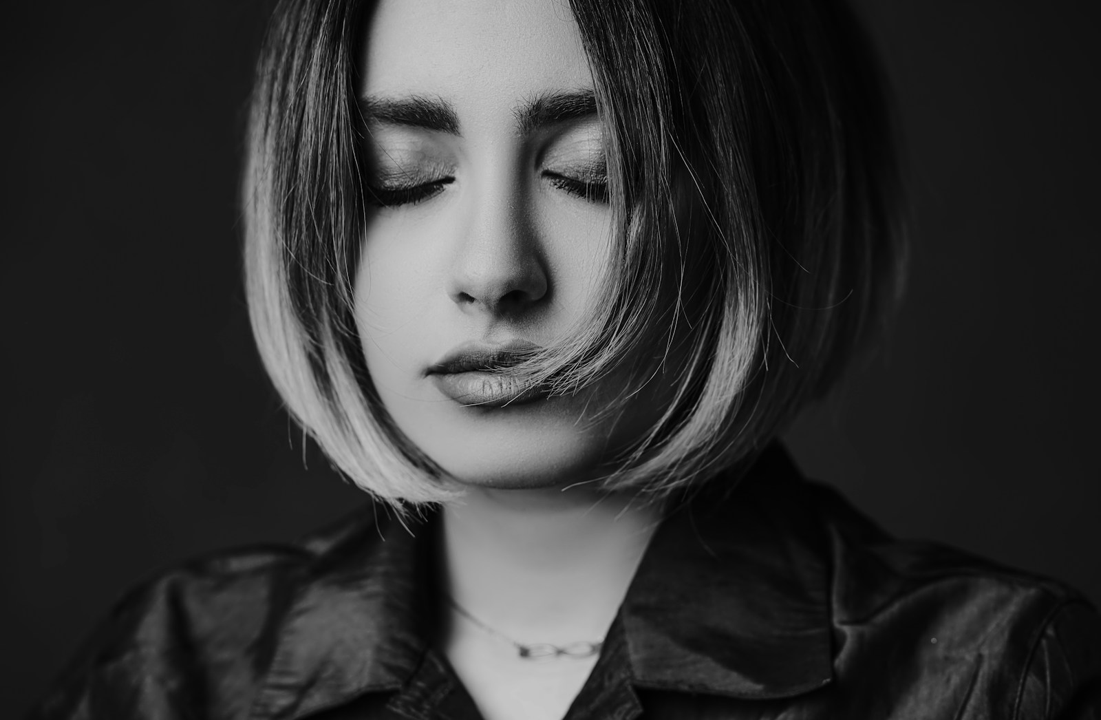 woman in black collared shirt